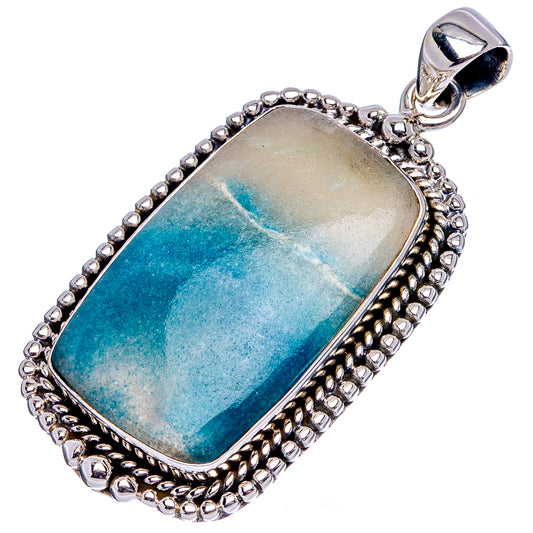 Sterling silver rectangular quartz pendant with blue-green center stone and loop bail