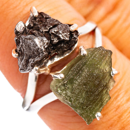 Sterling silver ring with green rough gemstone and dark meteorite-style stone, prong set