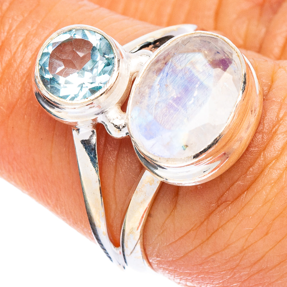 Sterling silver double-stone ring with light blue round and teardrop gemstones