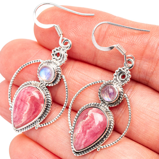 Sterling silver earrings with pink teardrop stone and iridescent round accents