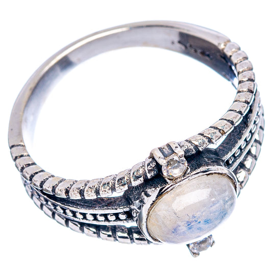Sterling silver moonstone dainty ring with oval moonstone detail and engraved textured band