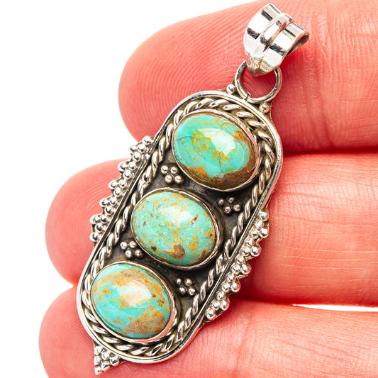 Sterling silver turquoise pendant with three round cabochons in teal and gold tones