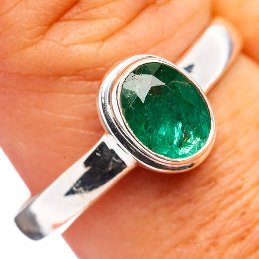Sterling silver ring with oval green emerald gemstone, bezel set