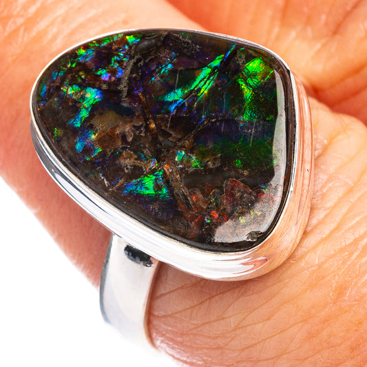 Sterling silver ammolite inlay ring with oval dark stone, blue-green iridescence
