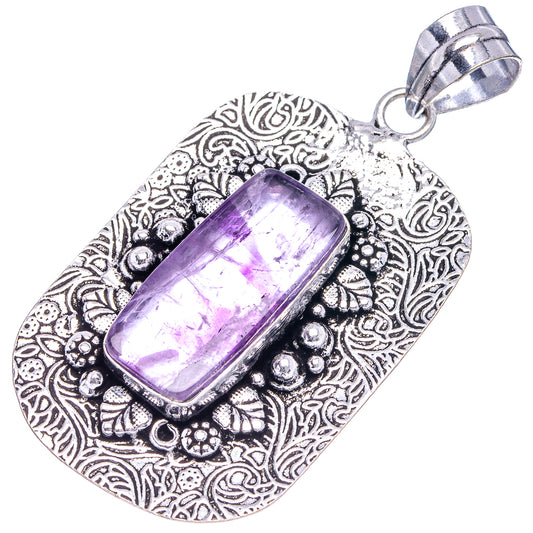 Amethyst rectangle pendant charm, German silver frame with embossed filigree and bail.