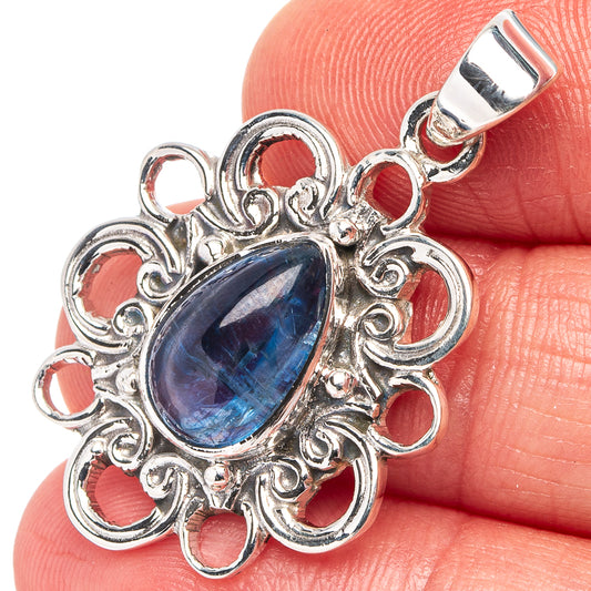 Sterling silver kyanite pendant close-up, blue teardrop stone with loop bail