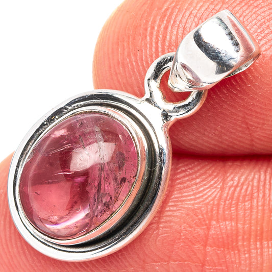 Oval pink tourmaline pendant in .925 sterling silver bezel with polished bail
