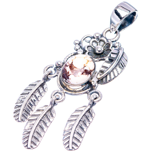 Sterling silver pendant with round jasper cabochon, floral centerpiece, and feather charms