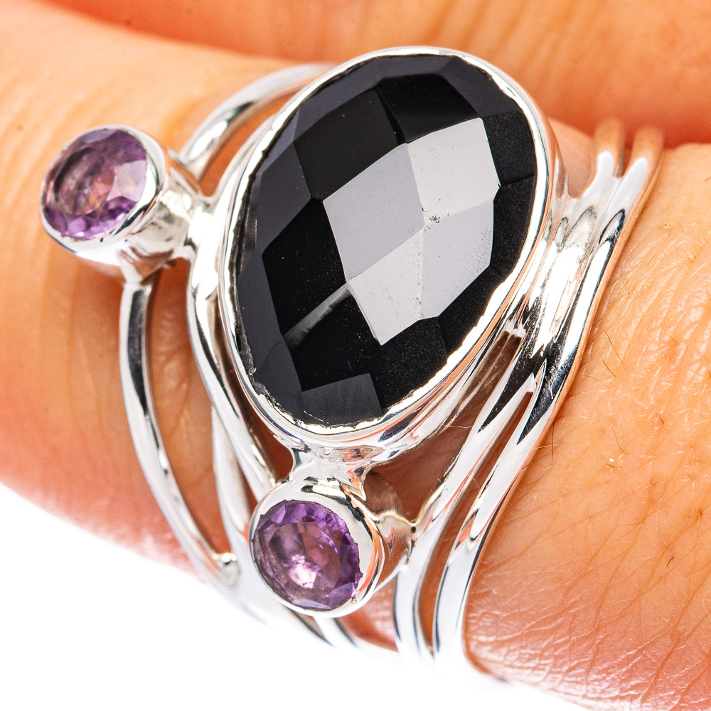 925 sterling silver ring with oval black onyx and three purple gemstone accents