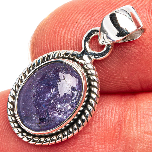 Oval tanzanite pendant, dark blue-violet stone in sterling silver rope frame