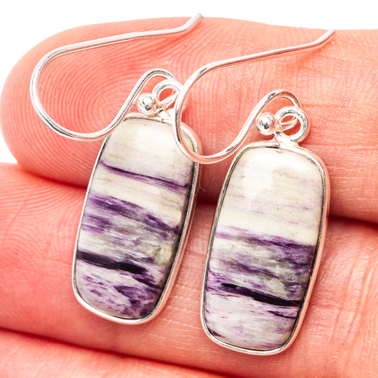 Sterling silver dangle earrings with oval purple-striped stone cabochons