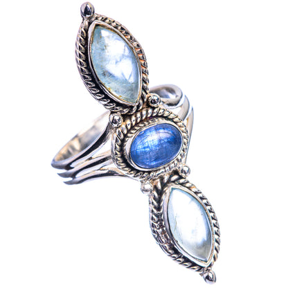 Silver statement ring with oval blue stones and detailed braided bezel design