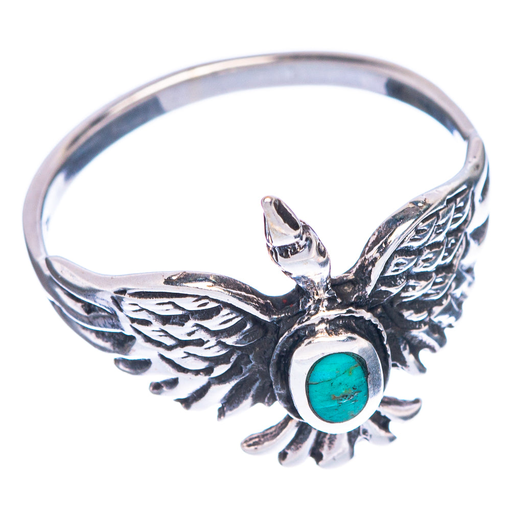 Turquoise cabochon bird ring in silver-tone, detailed wings and leaf accents