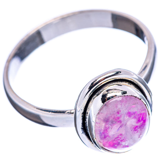 Round pink moonstone ring on sterling silver band, side view of bezel setting