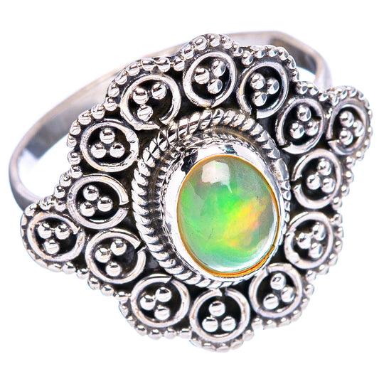 Sterling silver opal ring, round green opal set in ornate scrolling halo