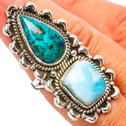 Sterling silver ring with blue teardrop stone and light blue oval stone in ornate setting
