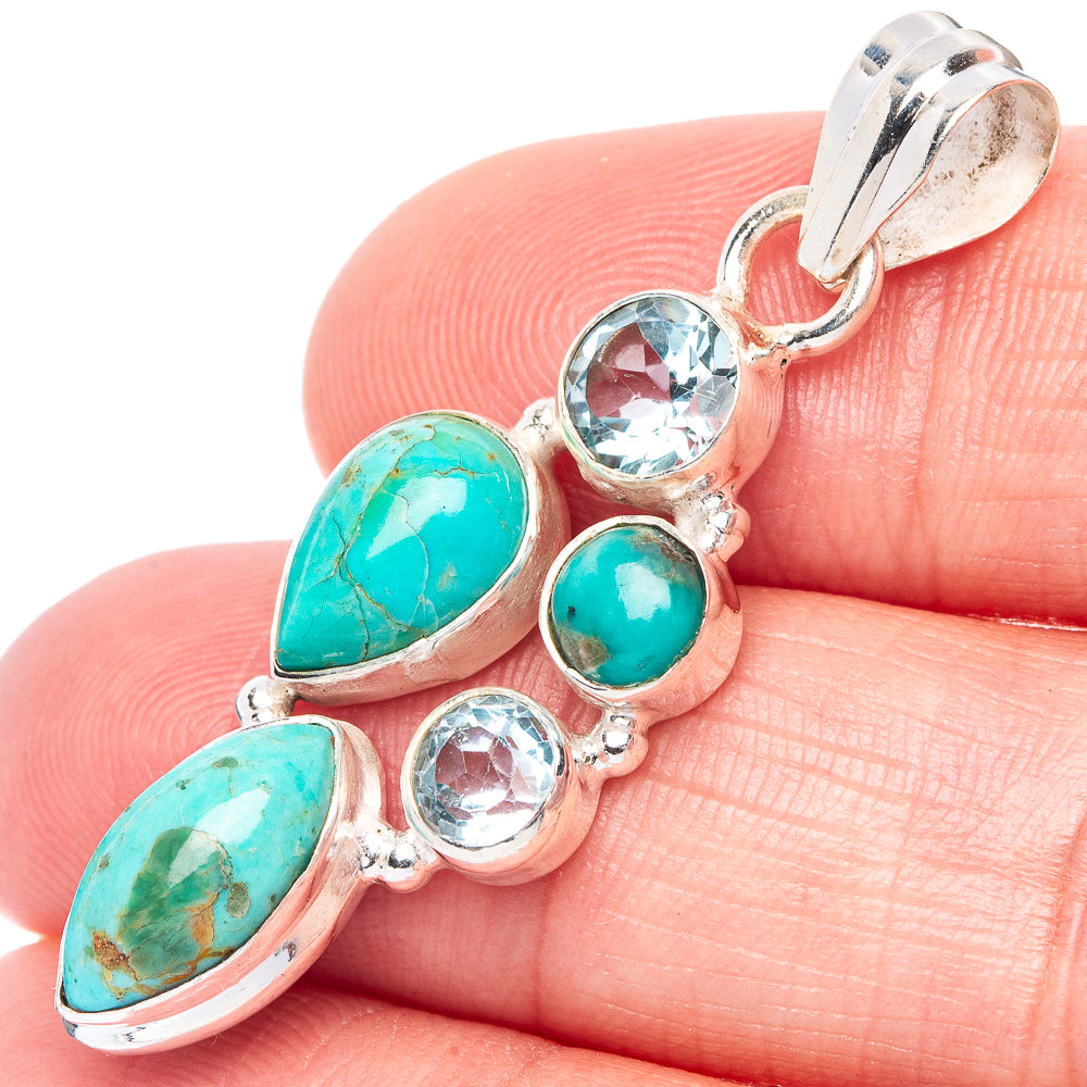 Sterling silver pendant with turquoise teardrops and blue topaz round stones