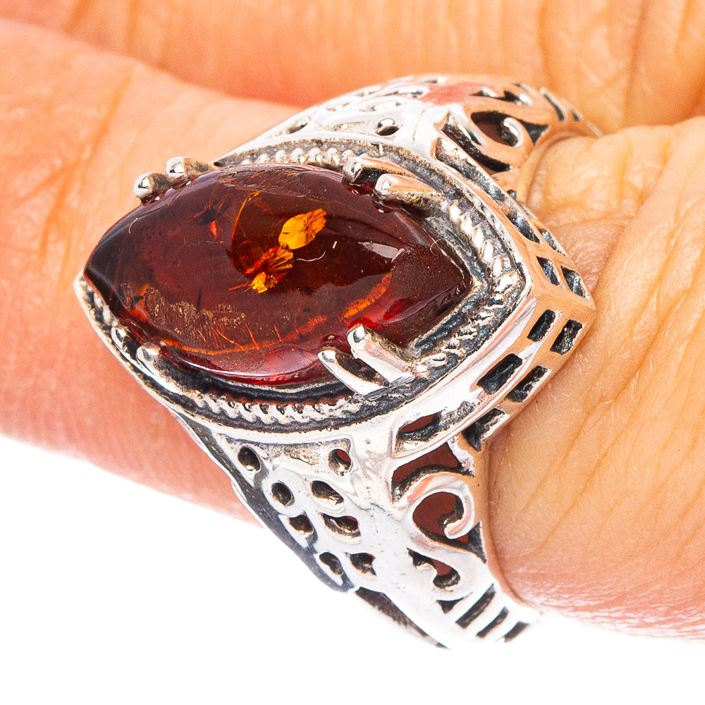 925 sterling silver ring with oval dark amber cabochon and ornate cutout band