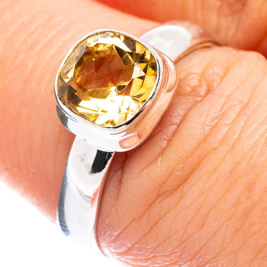 Faceted citrine gemstone ring in .925 sterling silver, polished band close-up