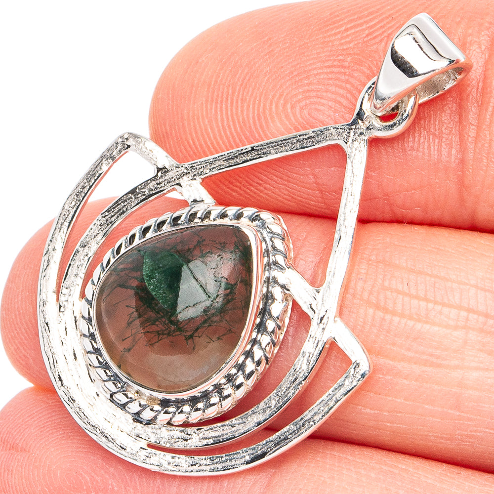 Sterling silver moss agate teardrop pendant with faceted green stone and ornate bezel