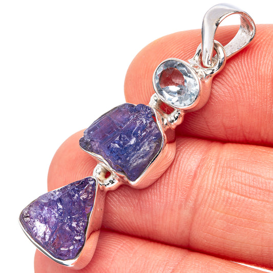 Sterling silver pendant with rough blue/purple stones and round blue topaz