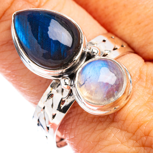 Sterling silver double-stone ring with oval blue iridescent gemstone pair