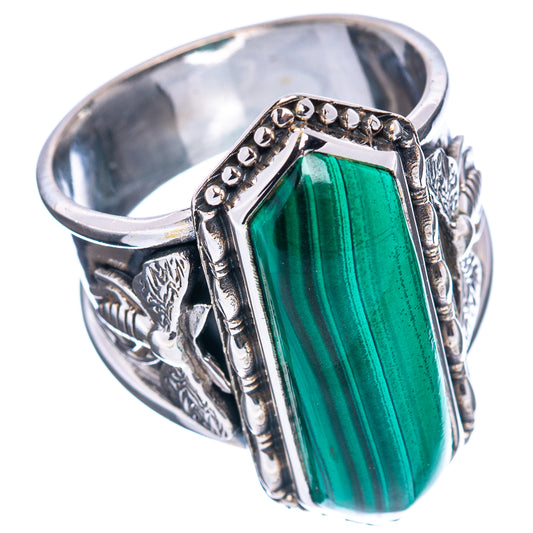 Sterling silver ring with green oval malachite cabochon and small bezel stones