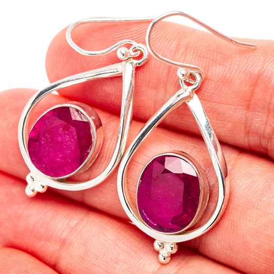 Teardrop sterling silver earrings with faceted purple ruby glass stone settings