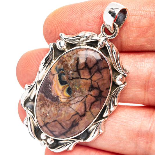 Sterling silver butterfly jasper pendant with oval mottled cabochon gemstone