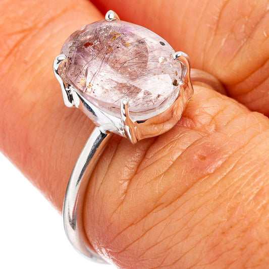 Sterling silver ring with oval faceted pink gemstone, size 6