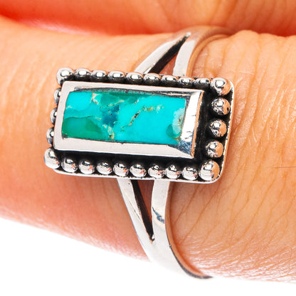 Turquoise rectangle gemstone ring in silver with beaded edge detail