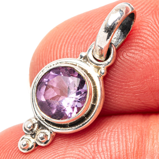 Amethyst round pendant with sterling silver bezel and ornate bail, purple gemstone detail