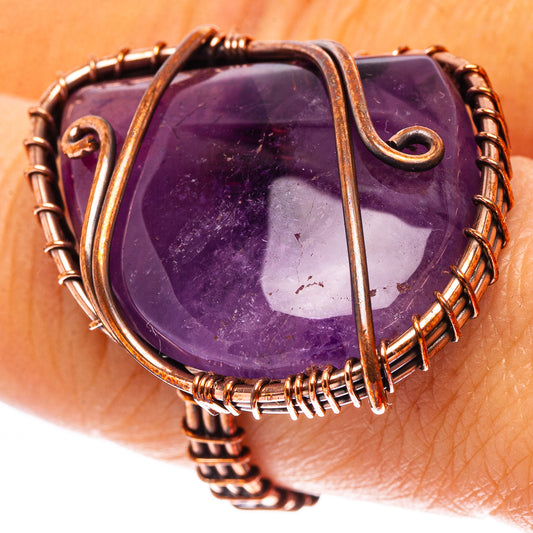 Amethyst cabochon ring in oxidized copper, wire-wrapped oval stone with spiral accents