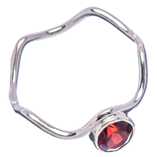 Sterling silver open band garnet ring with oval red faceted gemstone bezel