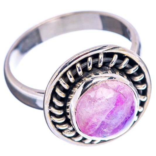 Pink moonstone oval cabochon on sterling silver band, scalloped prong frame