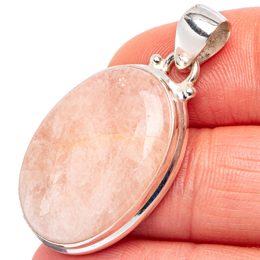 Oval rose quartz pendant in .925 sterling silver bezel, close-up on bail