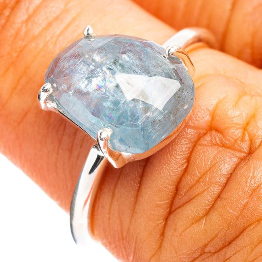 Aquamarine faceted oval ring with four-prong .925 sterling silver band