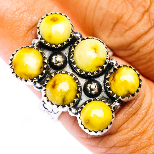 Multi-stone sterling silver ring with yellow cabochon stones in oval bezel settings