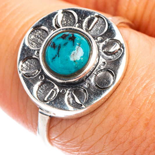 Turquoise cabochon dainty sterling silver ring with ornate bezel, top view