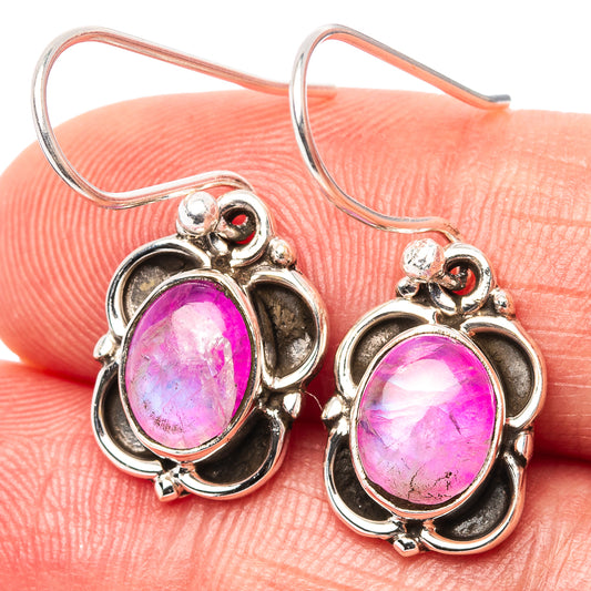 Oval pink moonstone drop earrings in .925 sterling silver, ornate floral frame