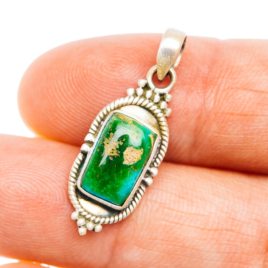 Sterling silver turquoise pendant with green gemstone and bead-textured frame