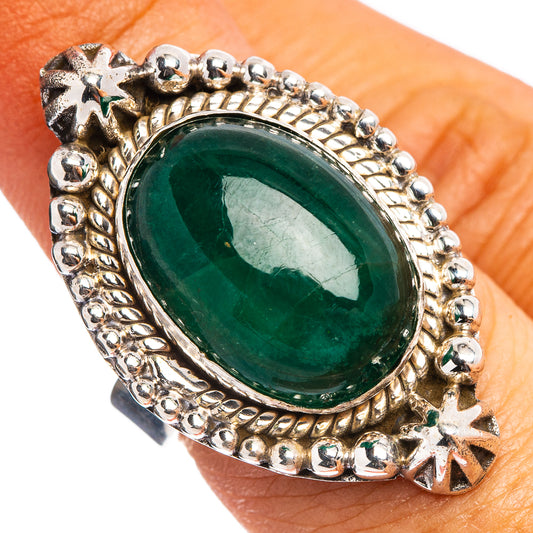 Oval dark green emerald gemstone sterling silver ring with beaded border and star accents