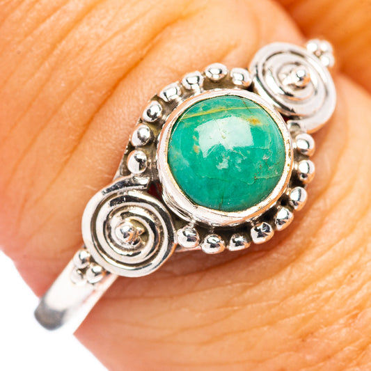 Round turquoise cabochon sterling silver ring with beaded gallery and spiral details