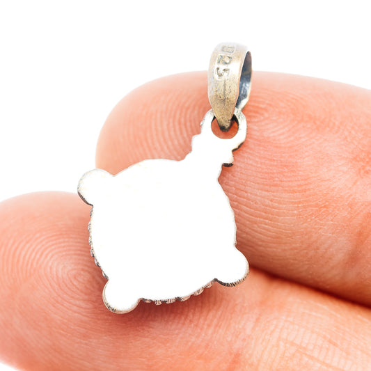 Sterling silver pendant with flat cutout back silhouette and bail