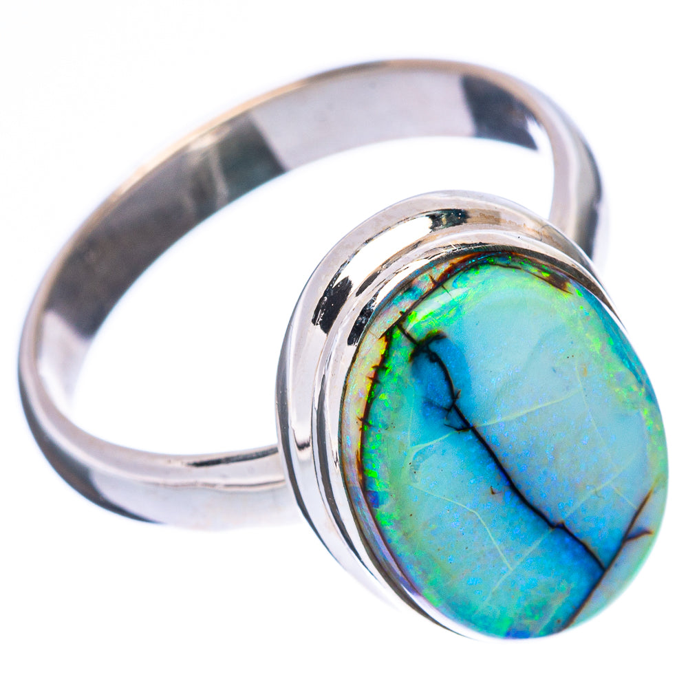 Oval light-blue opal cabochon in polished 925 sterling silver ring, side angle view