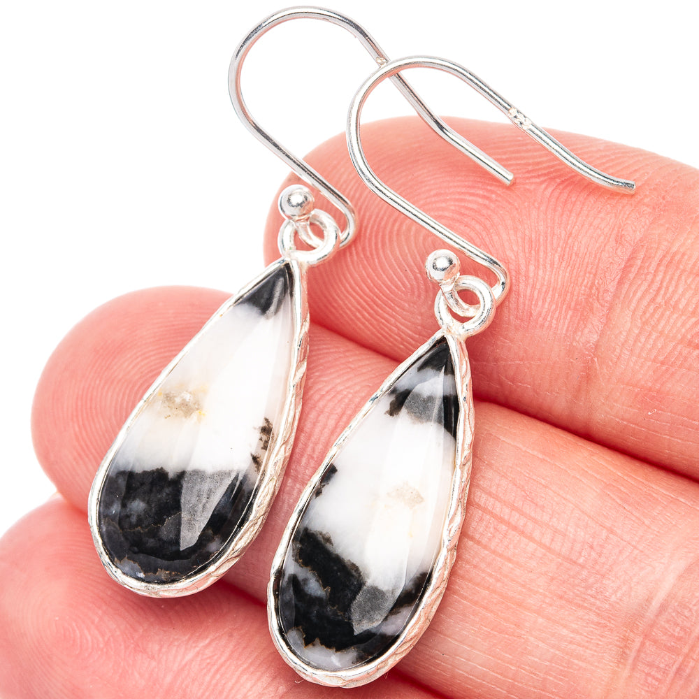 925 sterling silver teardrop earrings with black-and-white stone, close-up fishhook