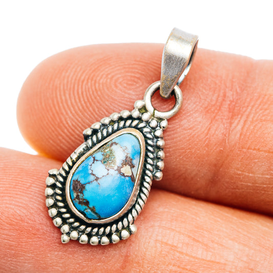 Turquoise teardrop pendant with silver bead edging and textured border, .925 sterling bail