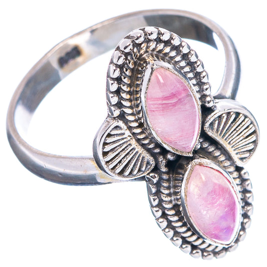 Sterling silver pink moonstone ring with two oval pink cabochons and ridged shell sides