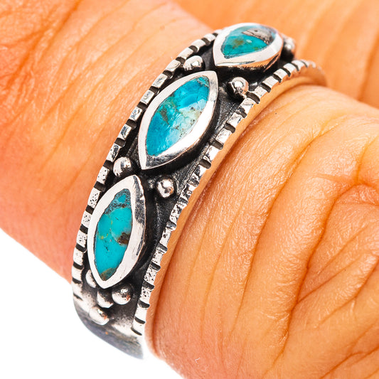 Turquoise oval gemstone sterling silver ring with engraved band and three bezel set stones