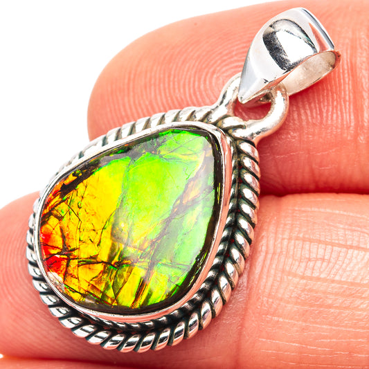 Sterling silver ammolite pendant with oval rainbow green-yellow stone and loop bail
